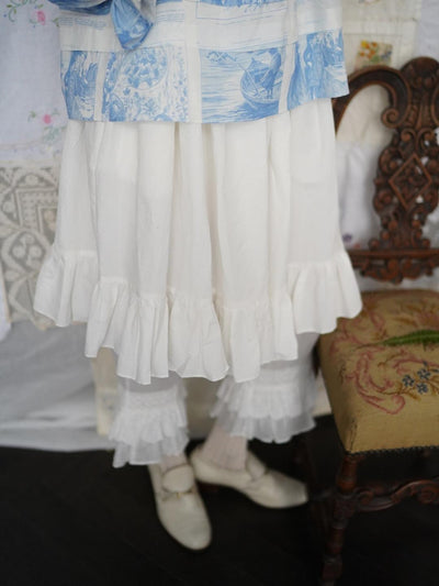 Unlogical Poem Double-Layered Printed Mesh Skirt with Petal Ruffles and Bubble Hem