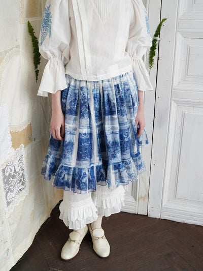 Unlogical Poem Double-Layered Printed Mesh Skirt with Petal Ruffles and Bubble Hem