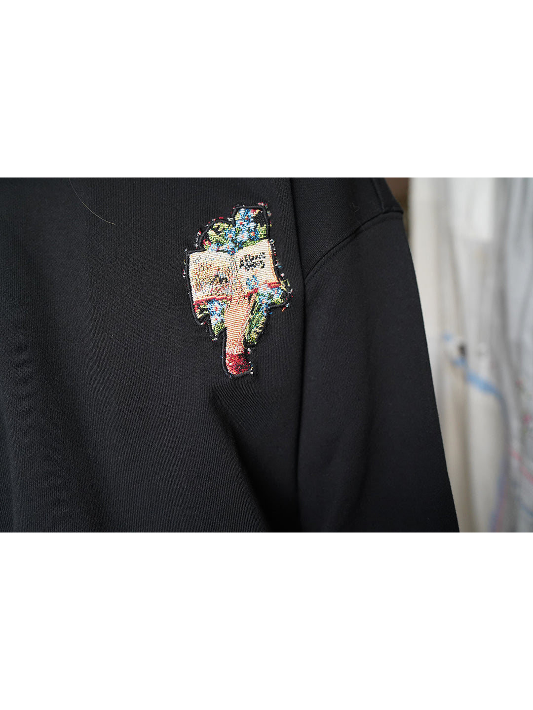 Unlogical Poem Rose Patchwork Black Sweater
