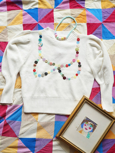 Unlogical Poem Buttons Knit Sweater