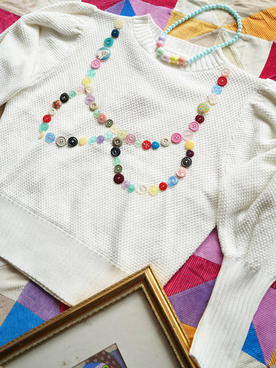 Unlogical Poem Buttons Knit Sweater