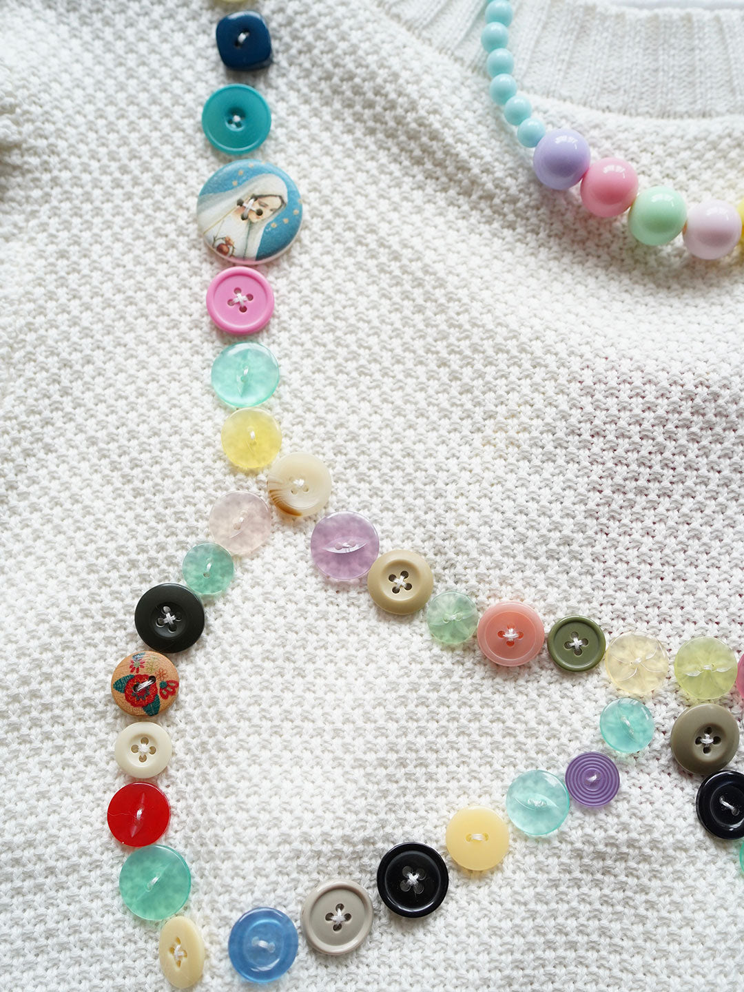 Unlogical Poem Buttons Knit Sweater