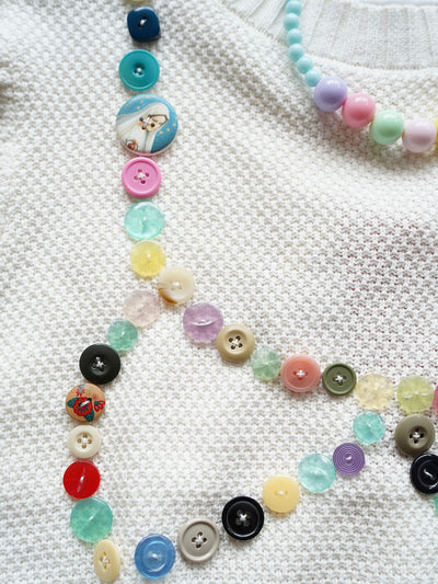 Unlogical Poem Buttons Knit Sweater
