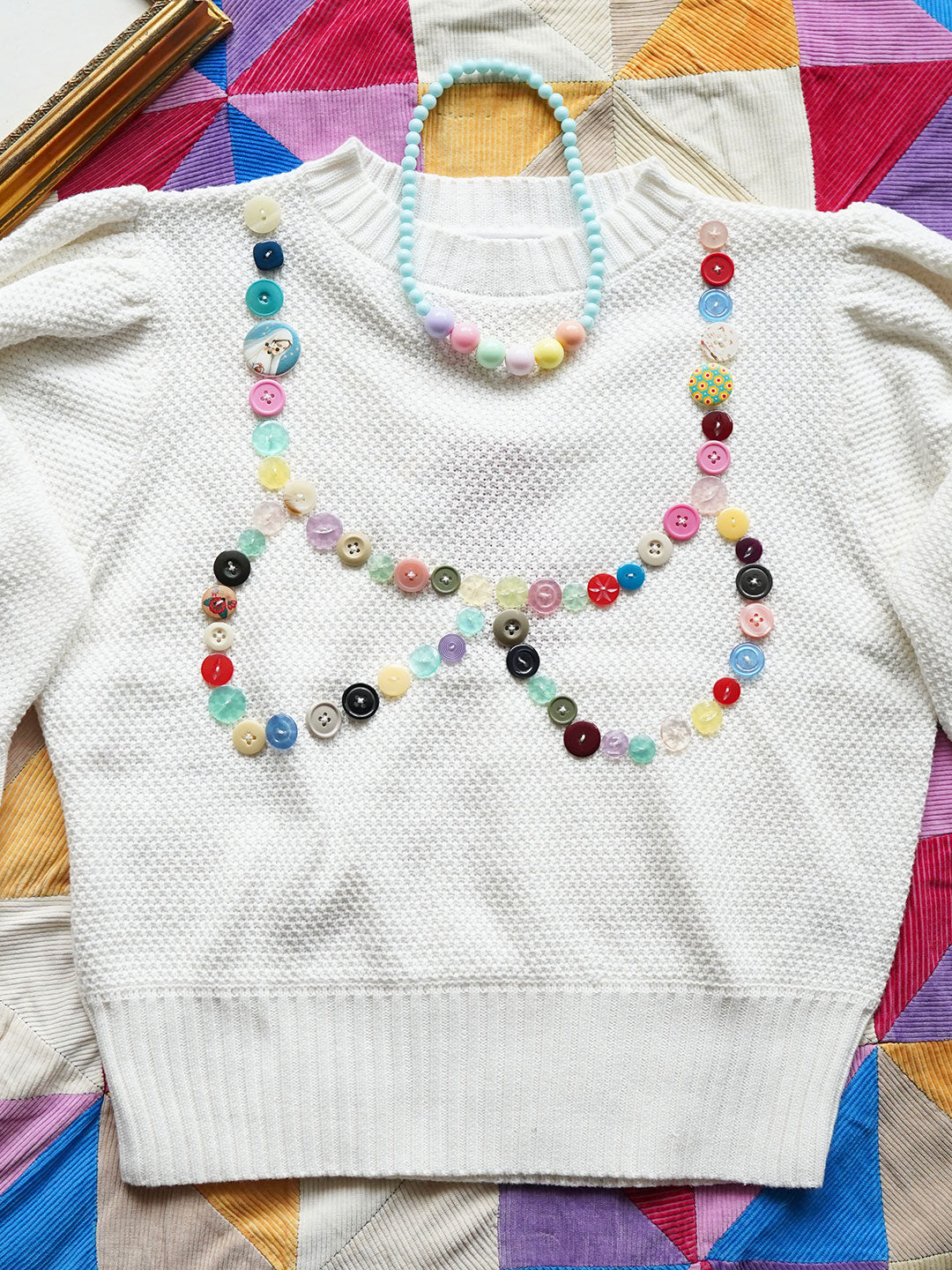 Unlogical Poem Buttons Knit Sweater