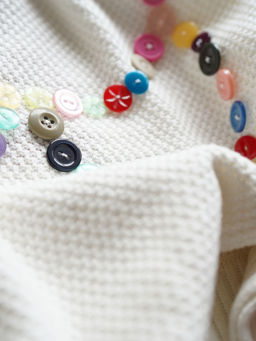 Unlogical Poem Buttons Knit Sweater